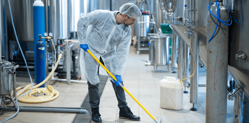 professional-industrial-cleaner-protective-uniform-cleaning-floor-food-processing-plant